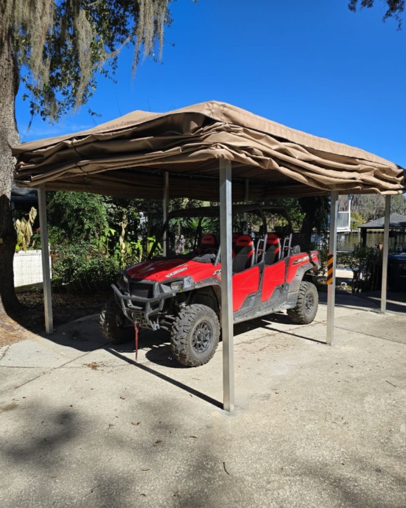Custom Touchless Cover® system covering a UTV, showcasing automated vehicle protection by Touchless Cover Arizona, Gotcha Covered Marine LLC.